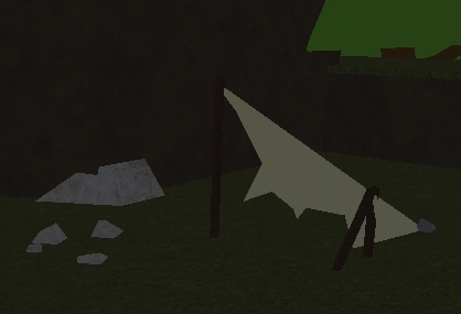 The ripped tent located on top of the hill.