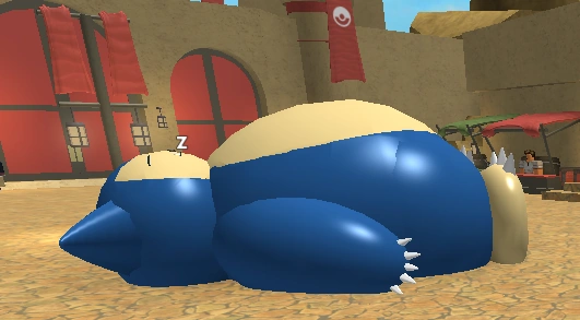 A Snorlax is sleeping in the town centre.