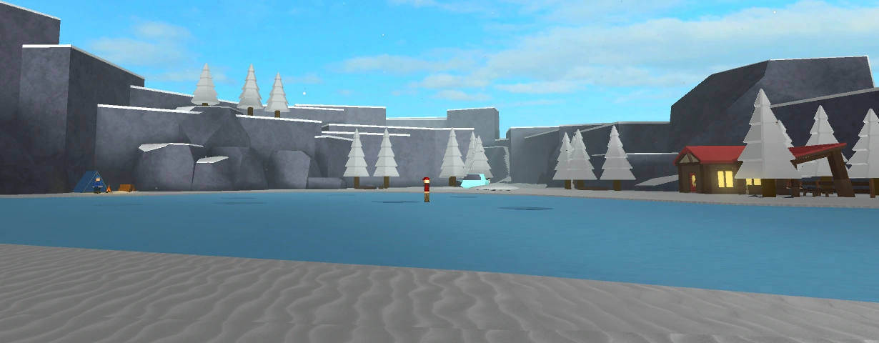 The frozen lake with a few holes for fishing. Ice Rock is on the far back.